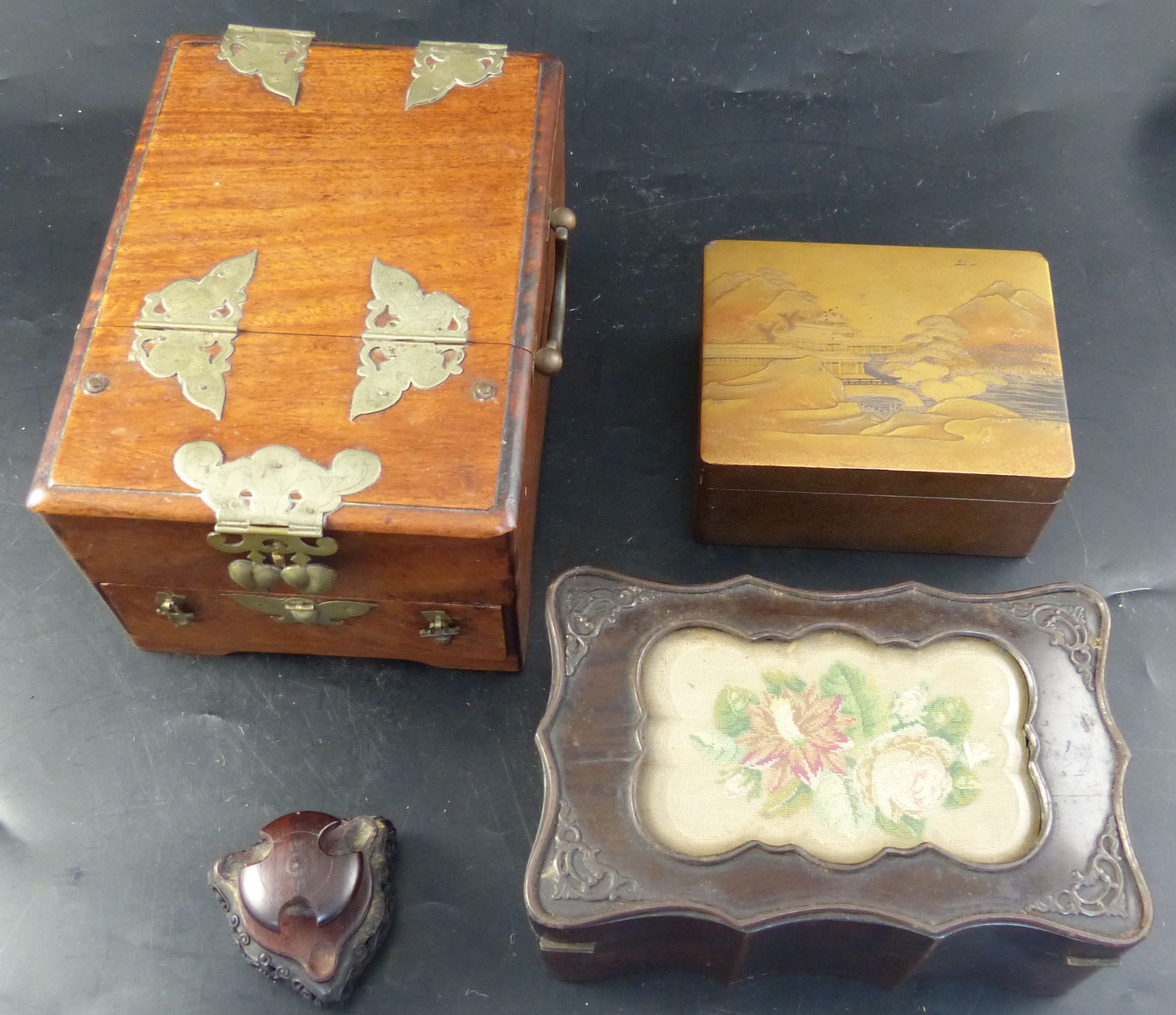 A Japanese Meiji period gold lacquer casket, toilet box, cigarette box & hardwood stand
